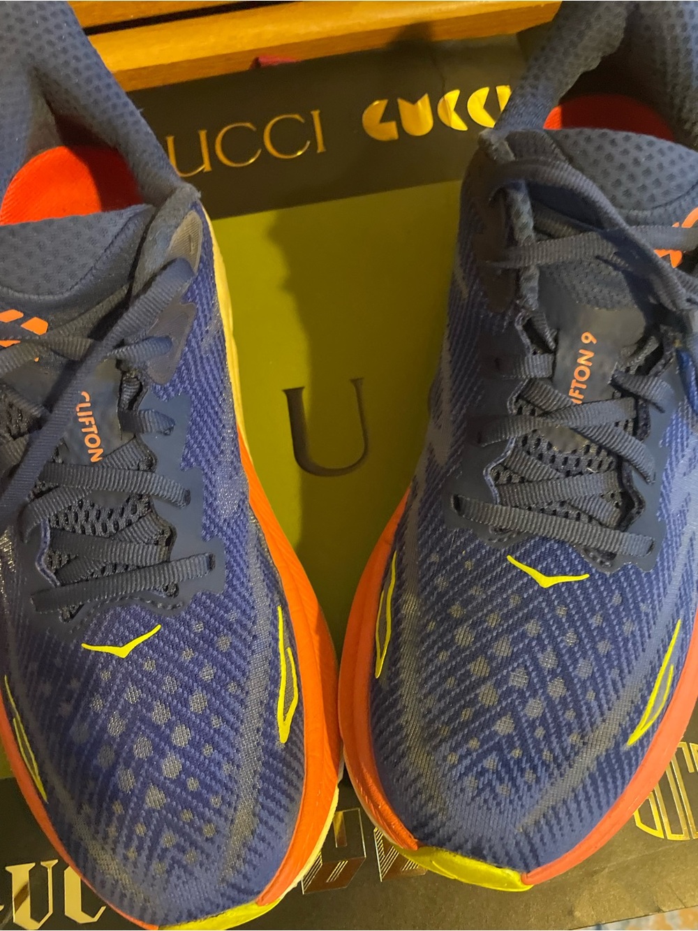 Hoka One One Clifton 9 Navy Blue with Orange and Yellow Accents